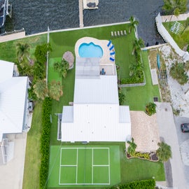 We have a putting green and a tennis court!