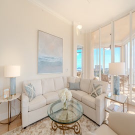 Lanai access from living room and lots of natural light and windows.