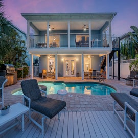 Shared pool with plenty of outside seating for everyone!