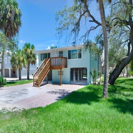 Welcoming coastal home with a charming front entrance.