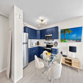 Beautiful Blue Dining Area and Kitchen.
