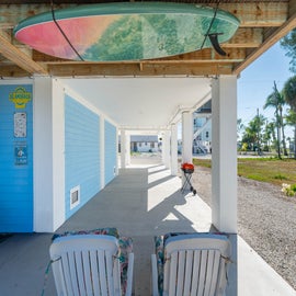 Parking and extra hangout area with grill.