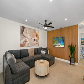 Living room with large flat screen TV Side 1