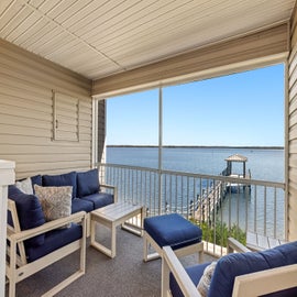 Shaded seating area with a beautiful view of the dock