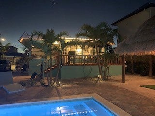 Deck and pool at night