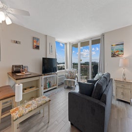 Living room with balcony access to watch the sunrise