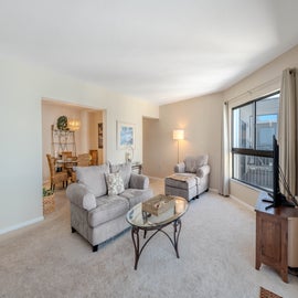 Open Floor Layout leads into Dining and Kitchen