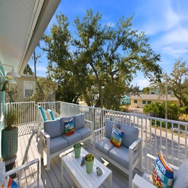 Enjoy the Private Upstairs Balcony.