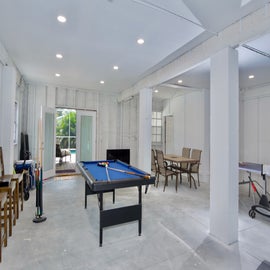 Pool table and ping pong table in garage