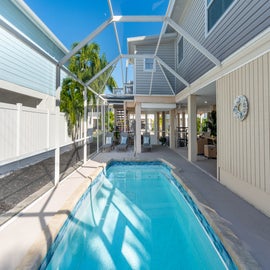 Enjoy the screened in pool area.