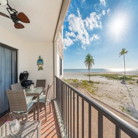 Balcony overlooking beach.