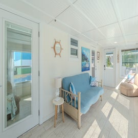 Upper sunroom and entryway.