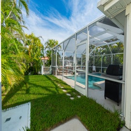 Dock area located behind pool.