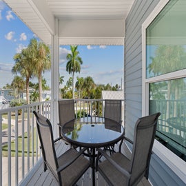 Sit on the covered porch and drink your morning coffee!