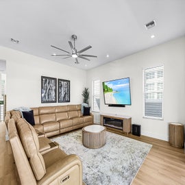 Oversized leather reclining couches enough space for everyone.