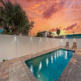 Enjoy the sunset poolside.