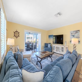Bright and open living room that leads to outside patio.